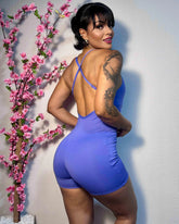 Macaquinho Fitness Virginia – Alças Trançadas, Costas Abertas e Bolsos Laterais